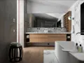 Salle de bain moderne avec meuble en bois clair, marbre et baignoire. Le bois est un excellent choix pour le meuble de salle de bain, alliant esthétique et durabilité.