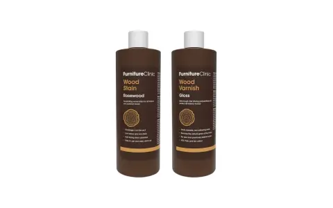 Deux flacons de produits pour bois FurnitureClinic, l'un de teinture "Rosewood" et l'autre de vernis "Gloss", dans une teinte profonde couleur bois de rose foncé.