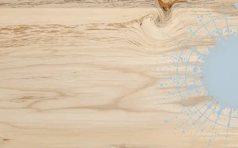 Nuancier saturateur bois : un fond de bois clair avec des motifs abstraits bleus rappelant des éclaboussures et des cercles.